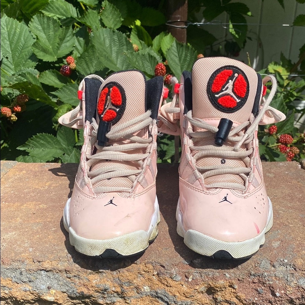Jordan Pink and Black Sneakers with Iconic Design used